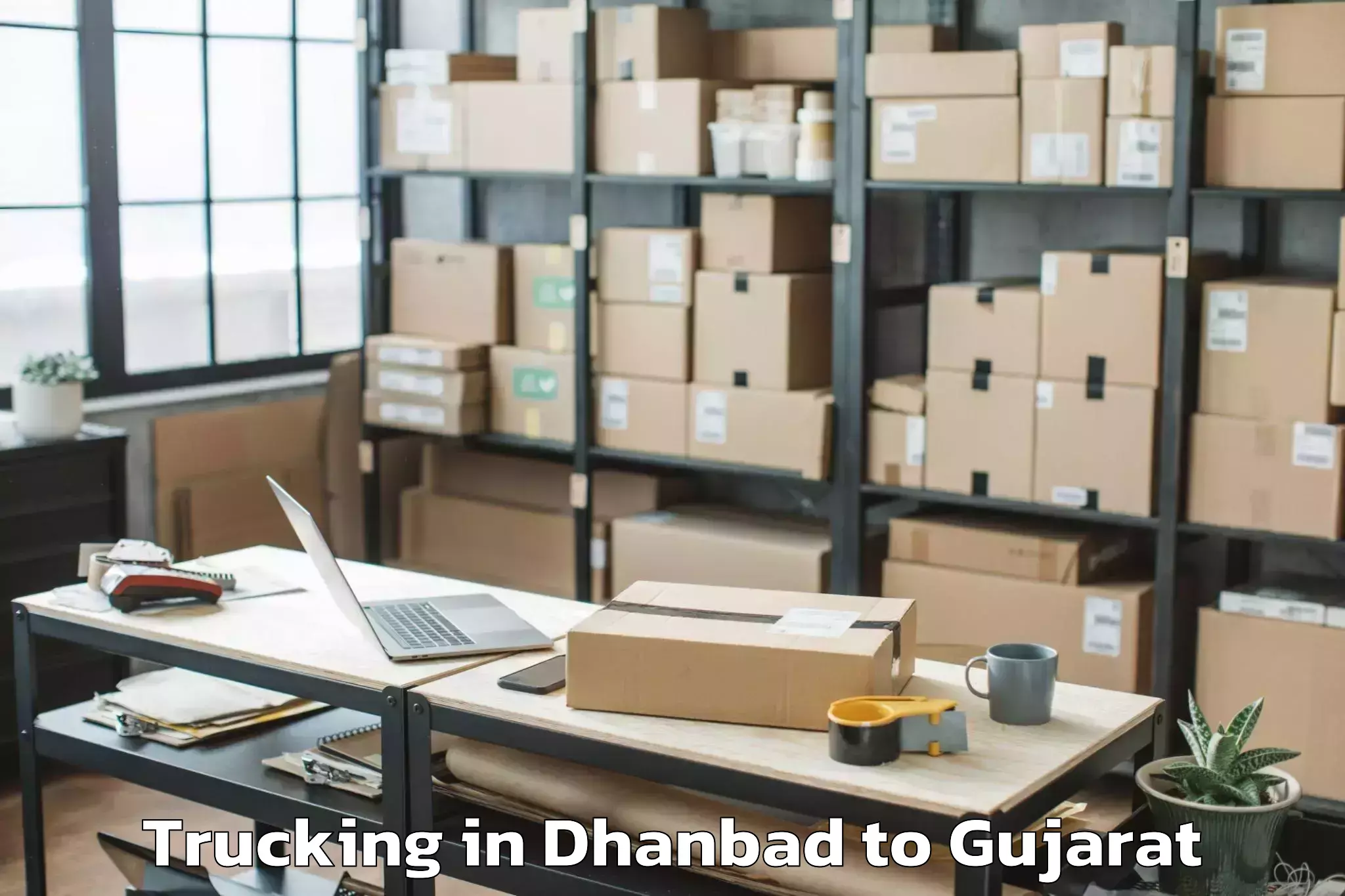 Top Dhanbad to Vatadara Trucking Available